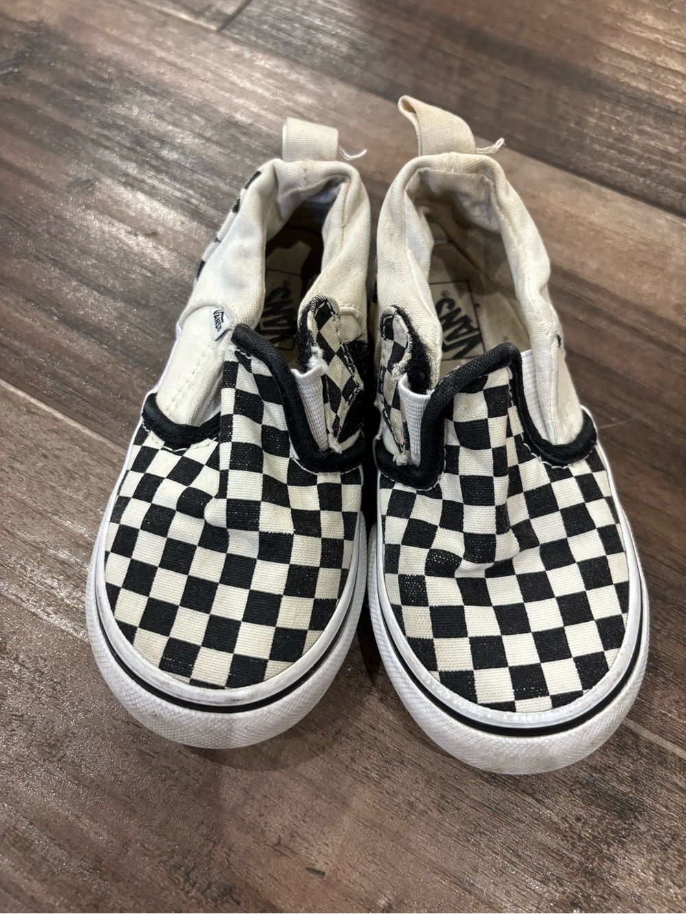 Vans Kids Checkerboard Slip-On Sneakers in Black and White
